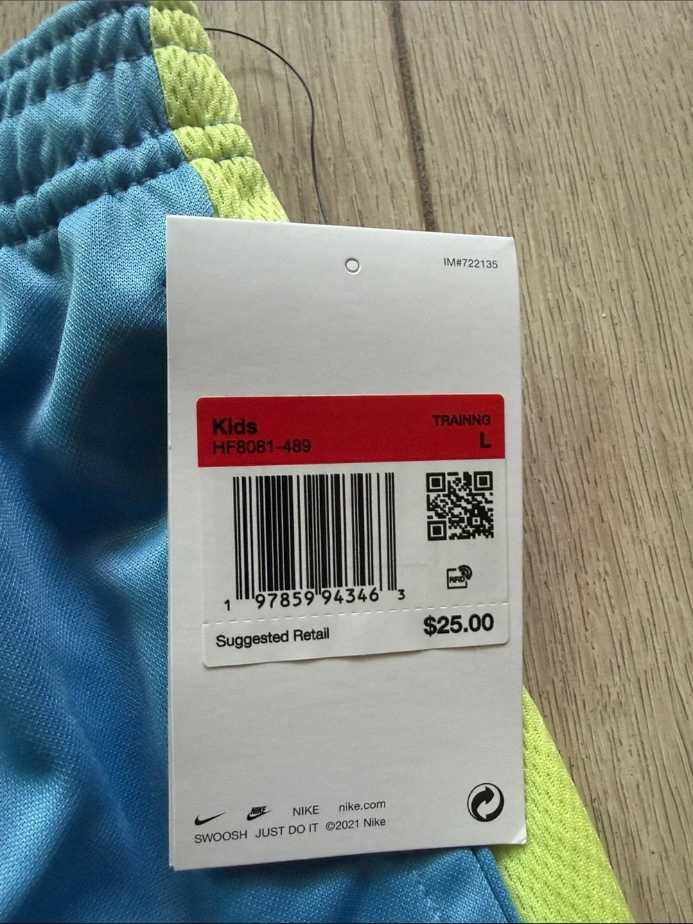 Nike KIDS Light Blue Athletic Shorts with Yellow Panels